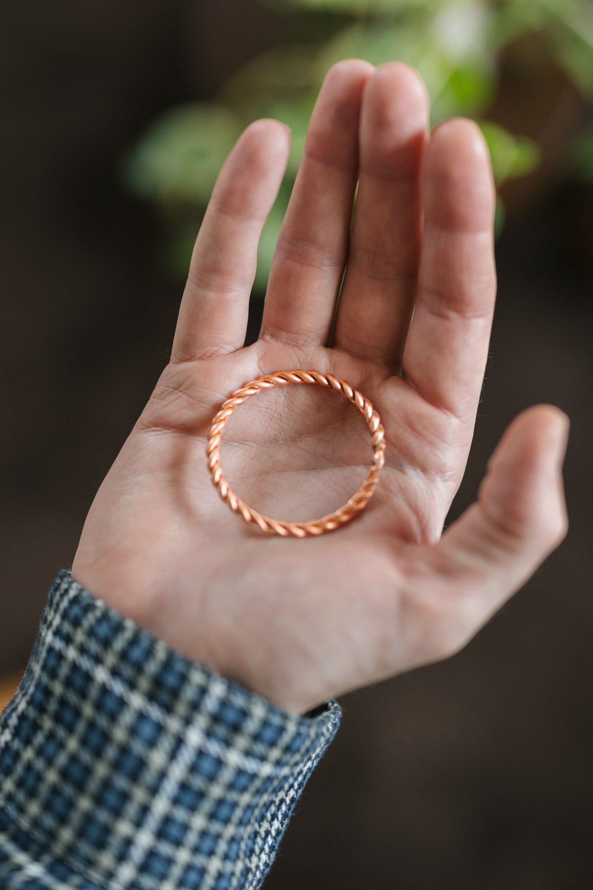 Kopero Copper Tensor Ring, on an open palm